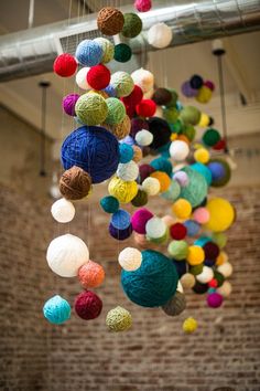 Pay homage to your craft with a downright cascade. | 34 Adorable Things To Do With Leftover Bits Of Yarn